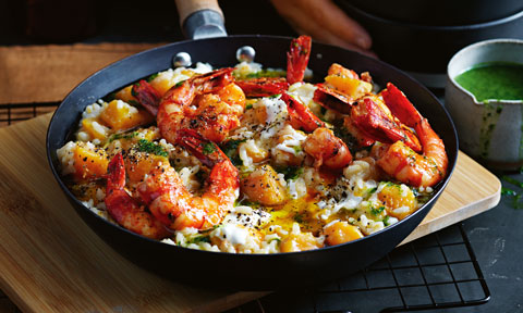 Pumpkin risotto with harissa prawns