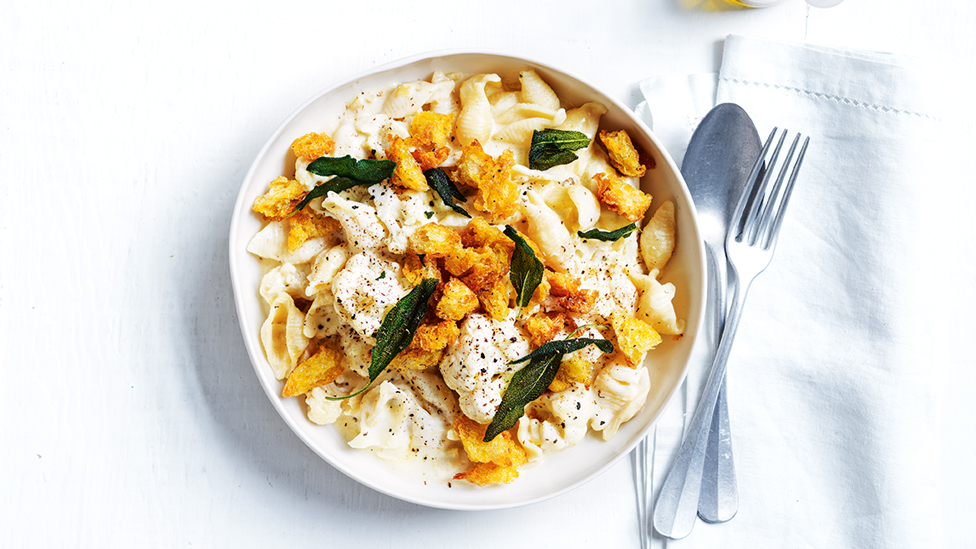 A slow cooked cheesey pasta bake in a bowl