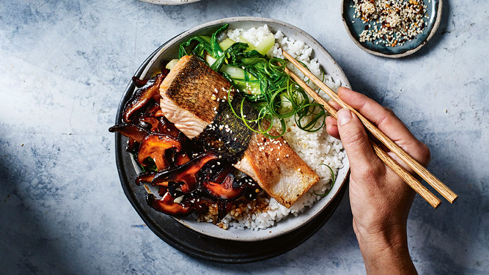 Sticky mushroom rice bowl with nori-wrapped salmon