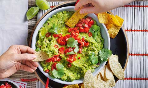 Spiced guacamole with corn chips