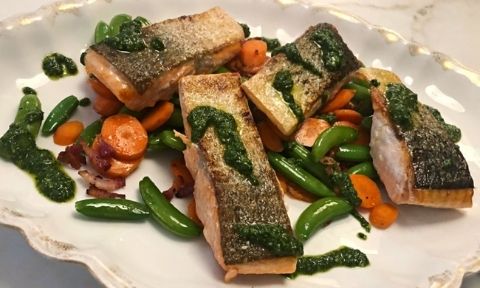 Crispy skin salmon with snap peas, carrots and chimichurri