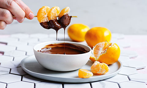 Mandarin segments with choc fondue