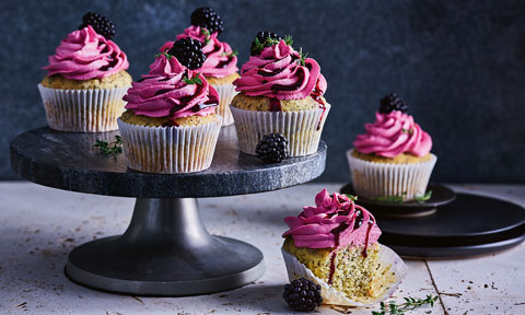 Citrus poppy seed cupcakes with blackberry frosting