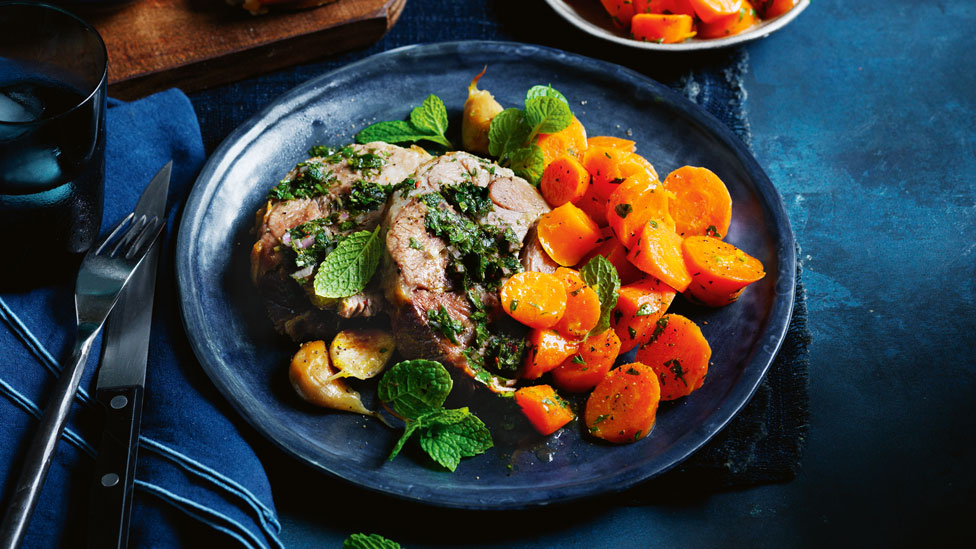 Lamb shoulder roast with carrots and chimichurri