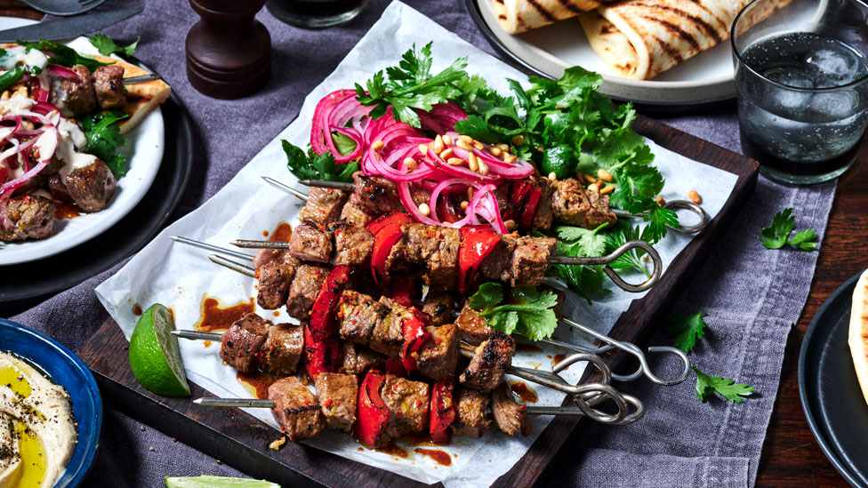 Spicy lime beef skewers with pickled onions