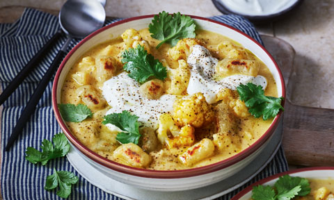Creamy pumpkin soup with yoghurt and gnocchi