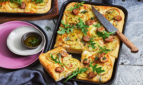 Tray bake potato pizza with sausage and rosemary