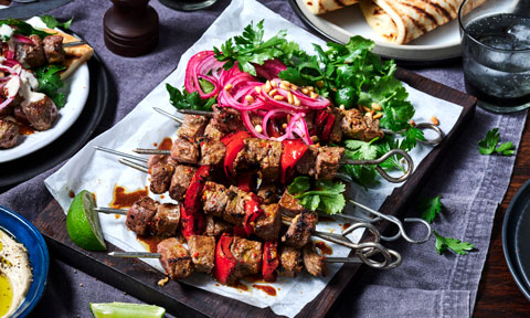 Spicy lime beef skewers with pickled onions