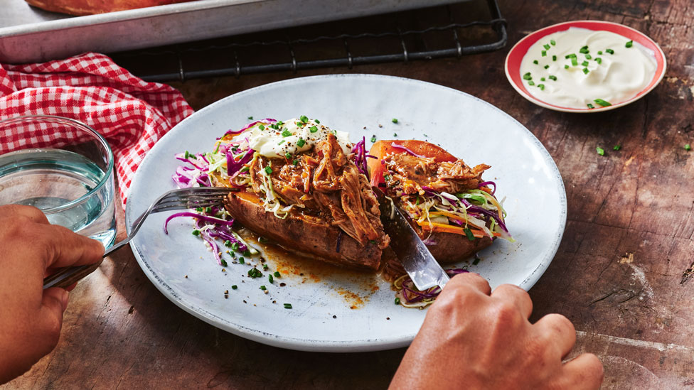 Baked sweet potatoes with pulled pork