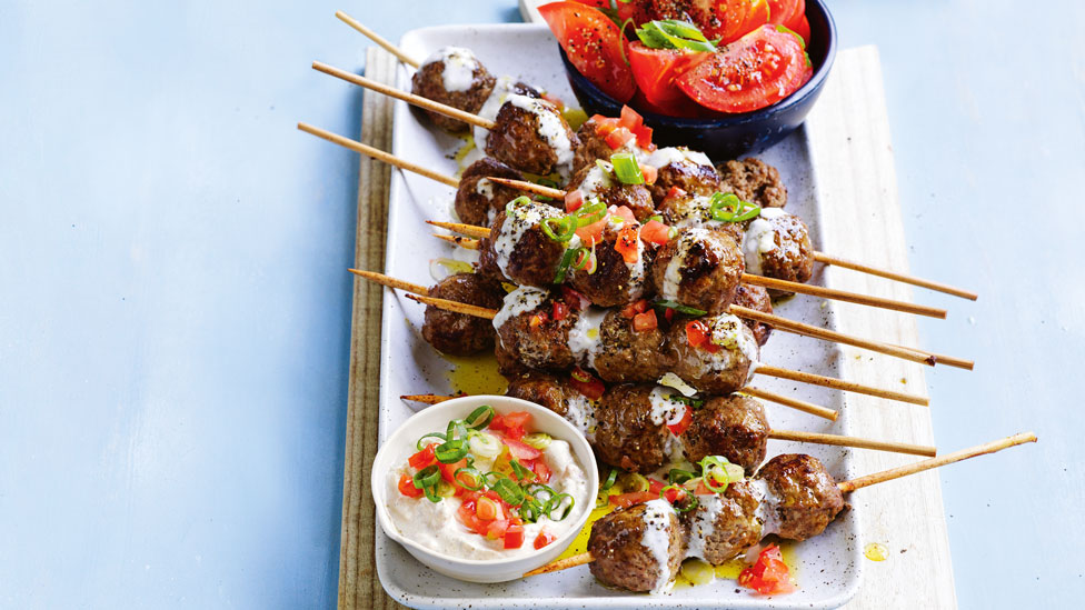 Lamb meatball skewers with tomato salad