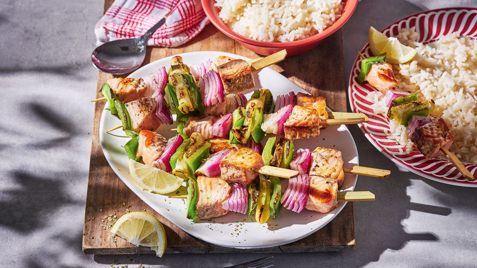 Salmon and veggie skewers with rice