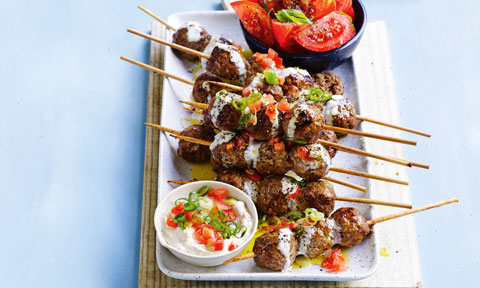 Lamb meatball skewers with tomato salad