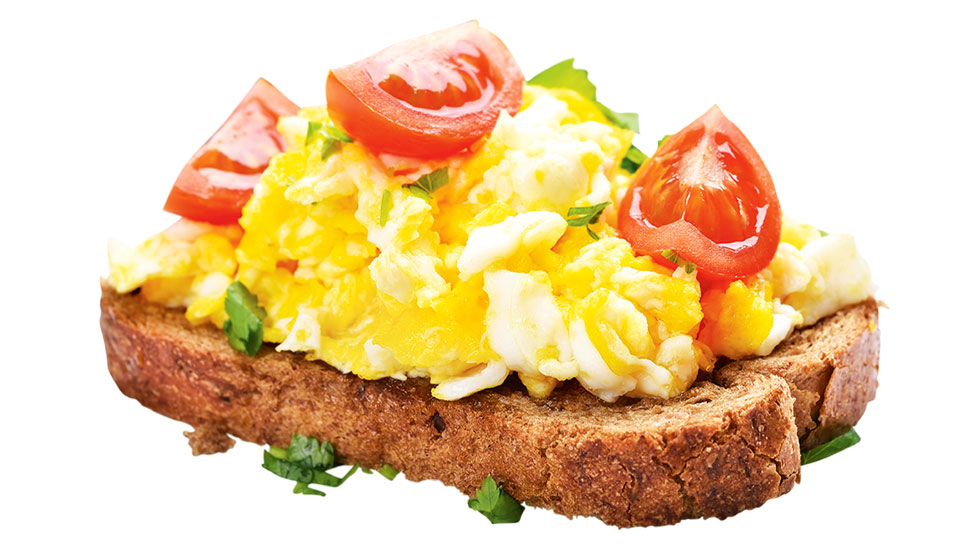 Scrambled egg on toast with tomato