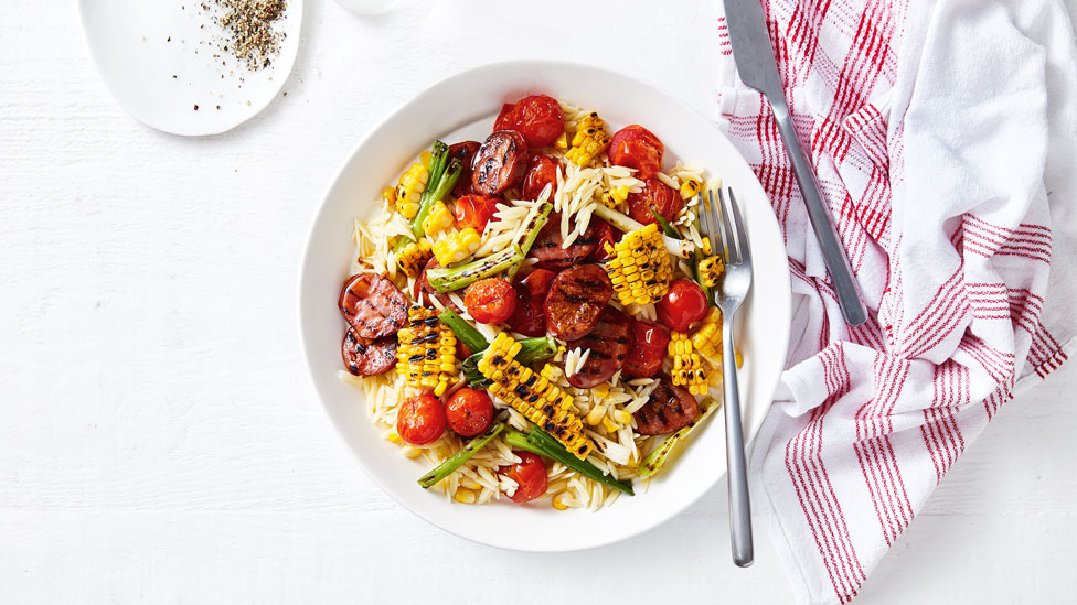 Grilled chorizo sauage with corn pasta salad