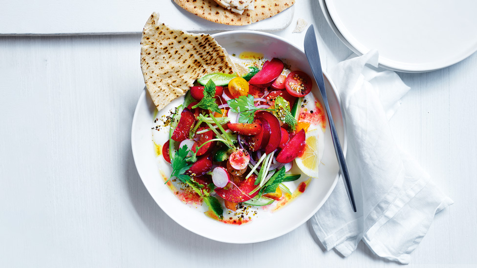 Plum salad with whipped fetta & dukkah and pita bread