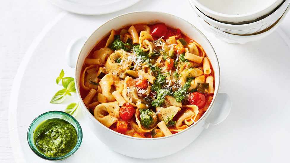 Tortellini soup with basil pesto and parmesan