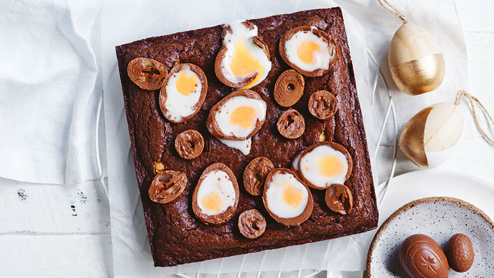 Creme brownie topped with halved Cadbury Creme Eggs