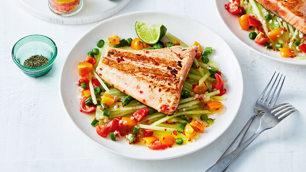 Roasted salmon tail with tomato and melon salad