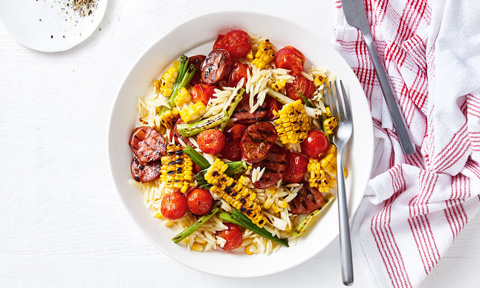 Grilled chorizo sauage with corn pasta salad