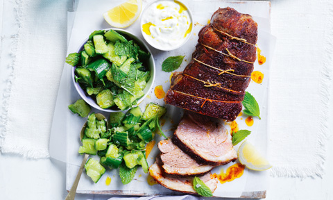 Thickly sliced lamb leg with smashed cucumbers and fennel tzatziki