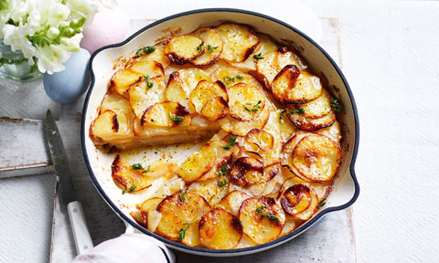 Potato, garlic and thyme torte cut into wedges