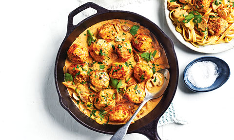 Chicken meatball stroganoff with chopped parsley