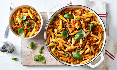 Mixed vegetable bolognese in a frying pan and a bowl