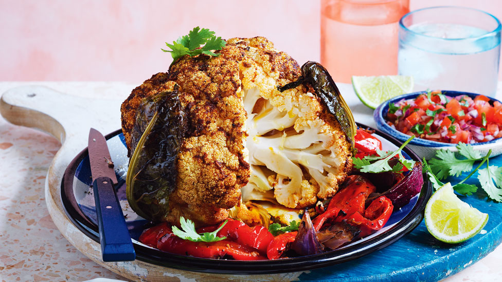 Curtis Stone's whole cauliflower roast with capsicum and coriander