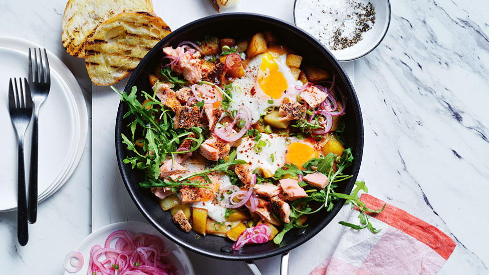 Paprika potatoes and eggs with hot smoked salmon 