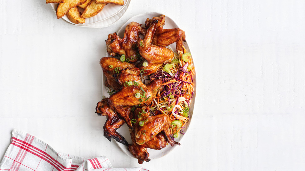 Smoky chicken wings with slaw and wedges
