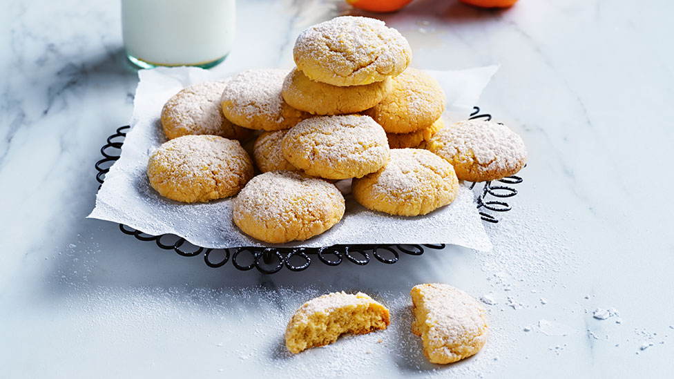 Stacks of orange and cardamom cookies