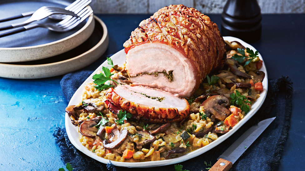 Roast porchetta with braised mushroom and barley