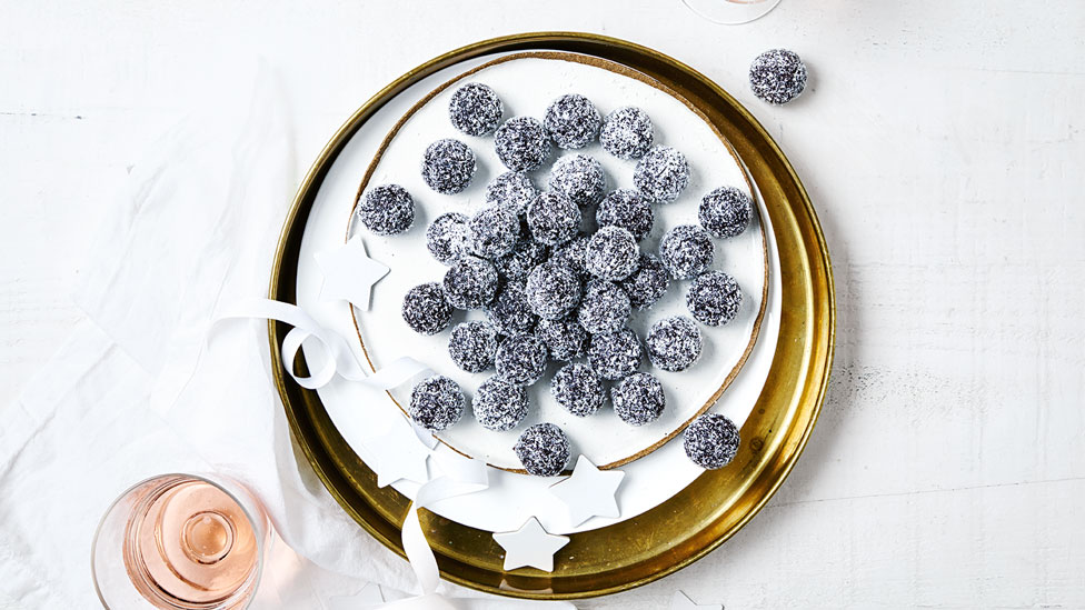 3-ingredient rum balls coated with coconut