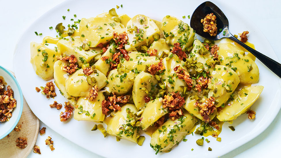 Honey mustard potato salad served with shallots