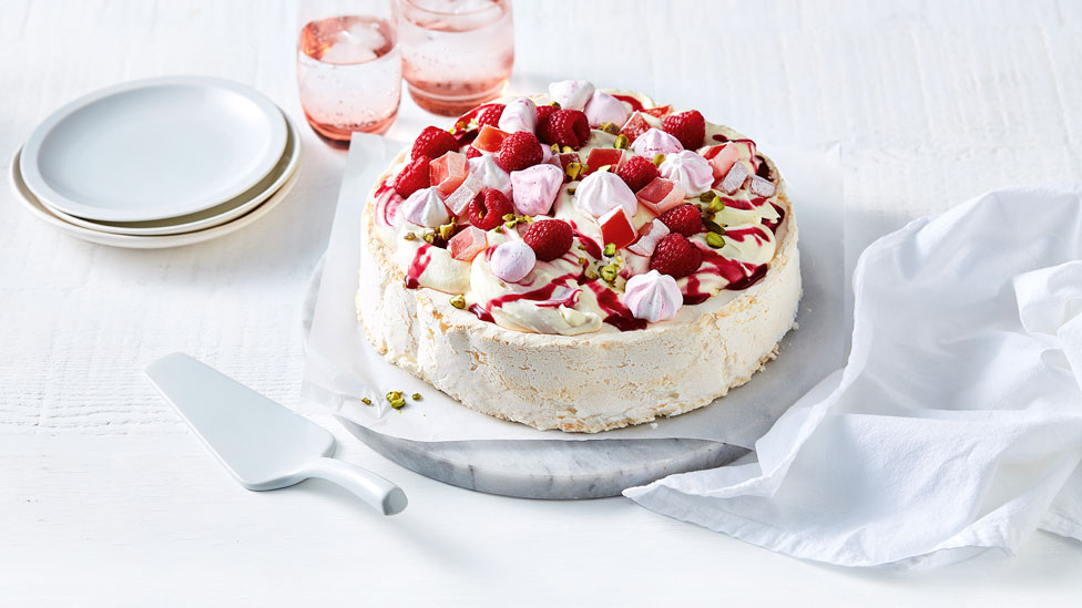 Raspberry rose pavlova topped with meringues and Turkish delight