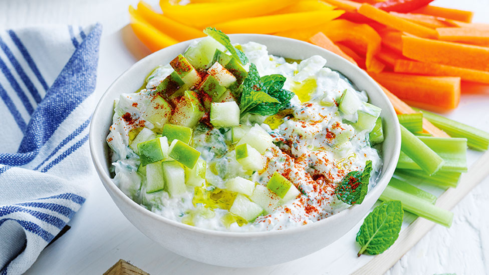 Tzatziki with green apple, cucumber chops and paprika