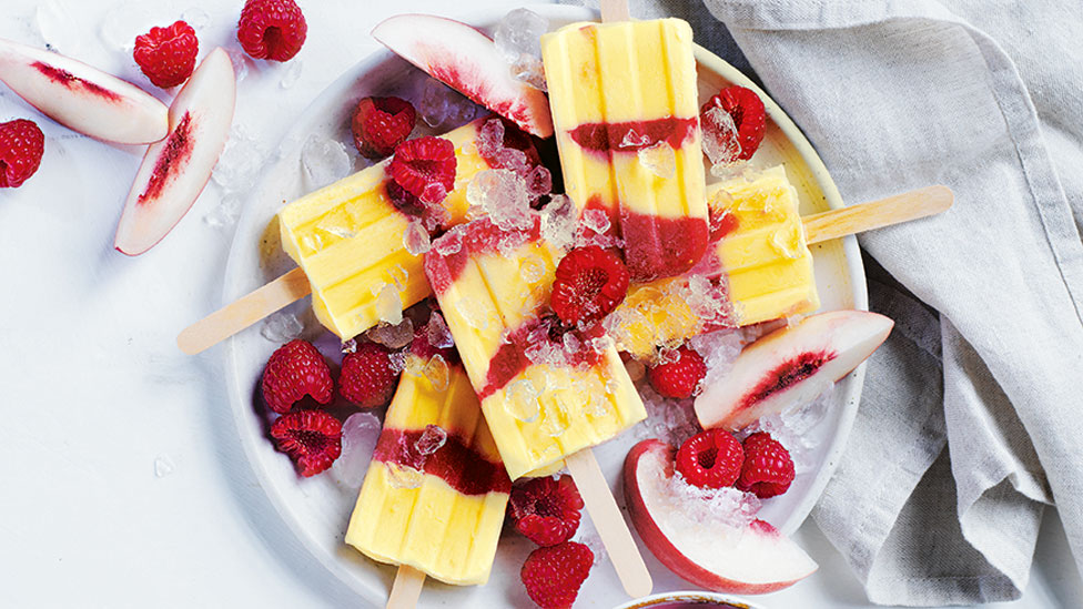 Stacks of peaches and cream ice blocks