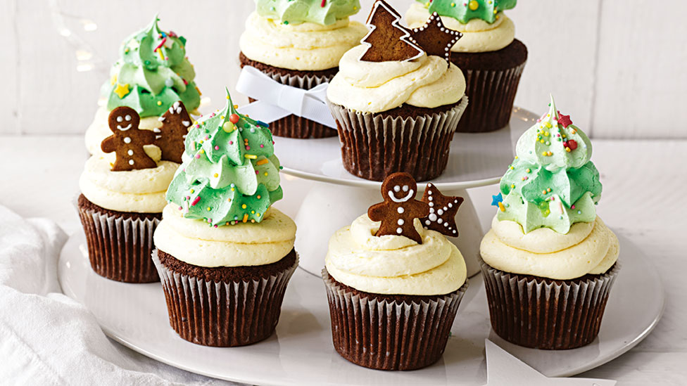 Seven spiced Christmas cupcakes with meringue trees and gingerbread biscuits