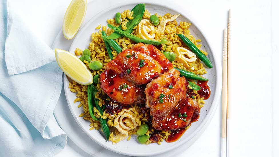 Sticky sesame chicken with mixed bean fried rice with lemon