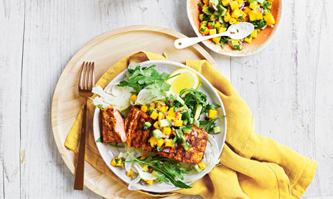 BBQ cajun salmon fillets served on top of avocado salsa