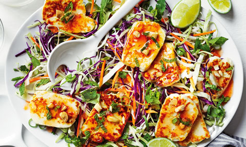 A plate of sweet chilli haloumi salad with cashew slaw