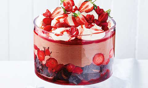 Chocolate brownie trifle with strawberries and blueberries