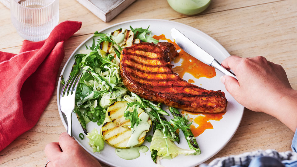 BBQ pork chops with apple and asparagus salad