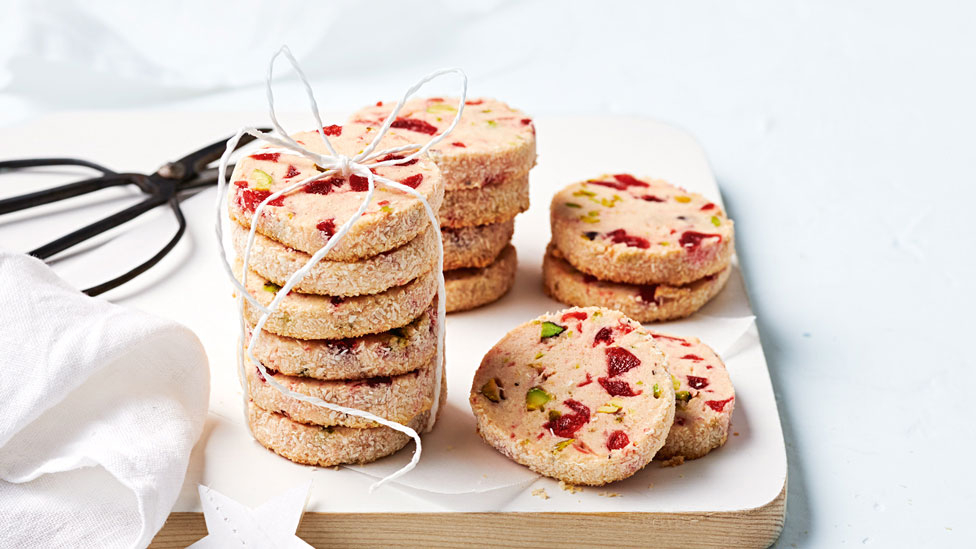 Almond and cherry biscuits stacked in ribbons