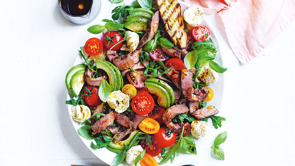 Beef, tomato and bocconcini salad on a plate