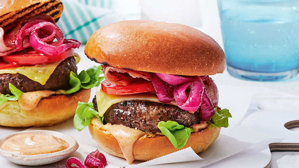 Two beef burgers with caramelised onion and aoili 