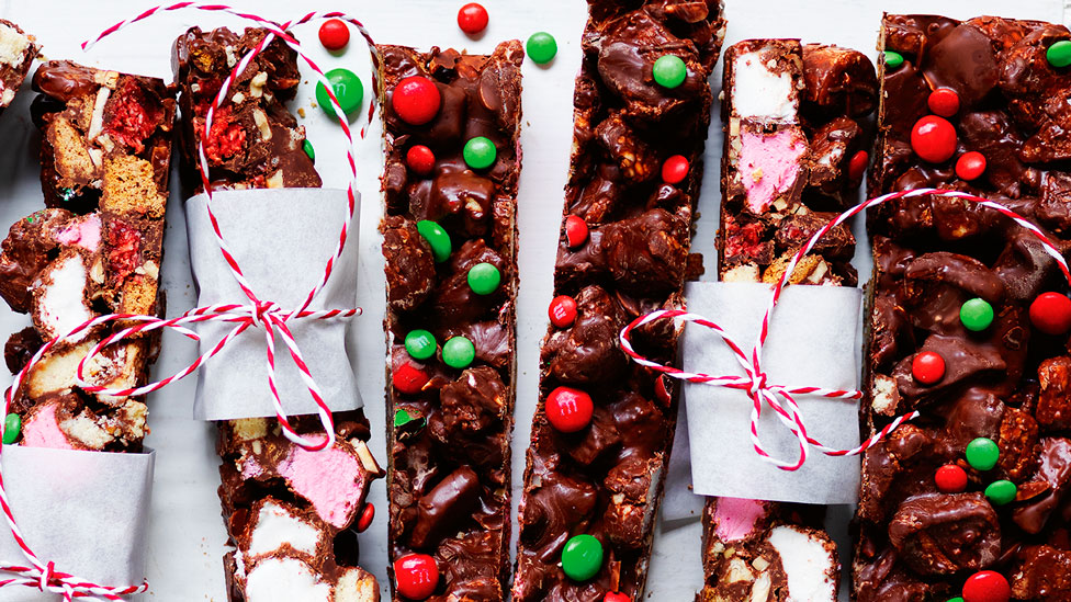 Several pieces of Christmas rocky road on a dish.