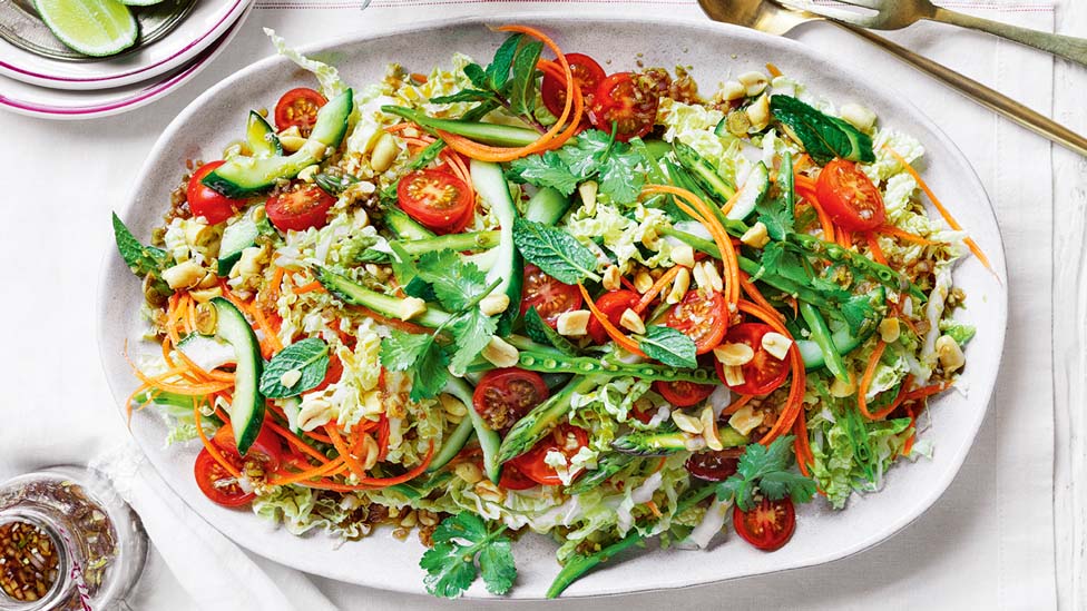 Asparagus and wombok salad on a dish.