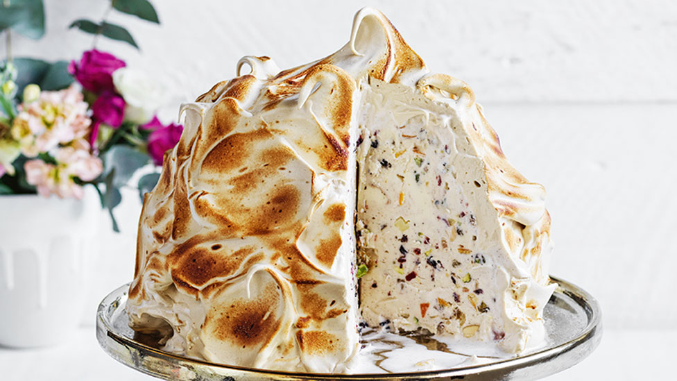 A Christmas ice cream pudding cut into wedges