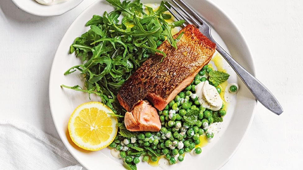 Garlic salmon with rocket and minted peas